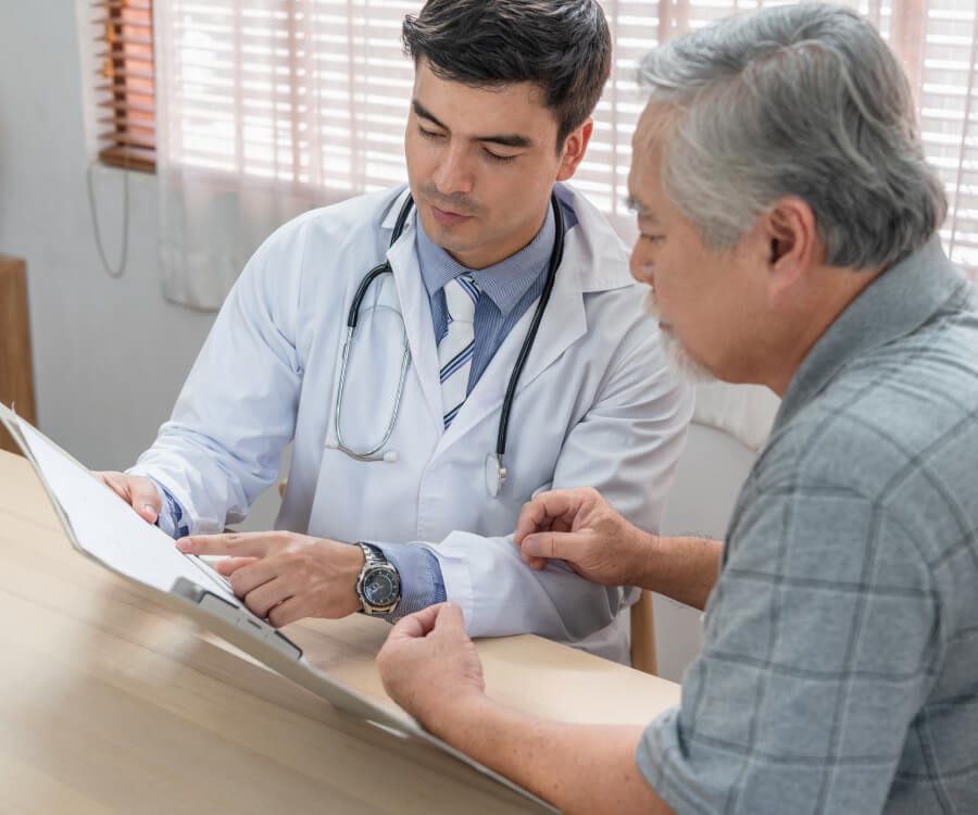 doctor reviewing documents with patient